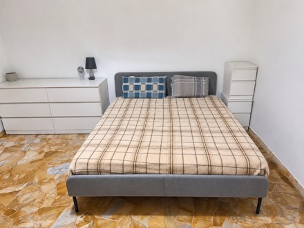 Large Single Room with Private Balcony · Via Fratelli Bronzetti · Elegant Residential Area