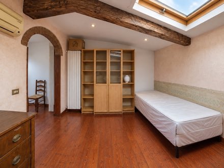 Attic Room with Brick Arch · Via dello Statuto 12 · T1 Tram at the Door · All Bills Included